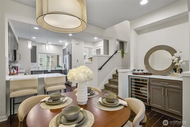 a kitchen with furniture and a stove