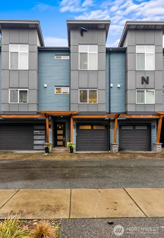 a front view of a building with glass windows