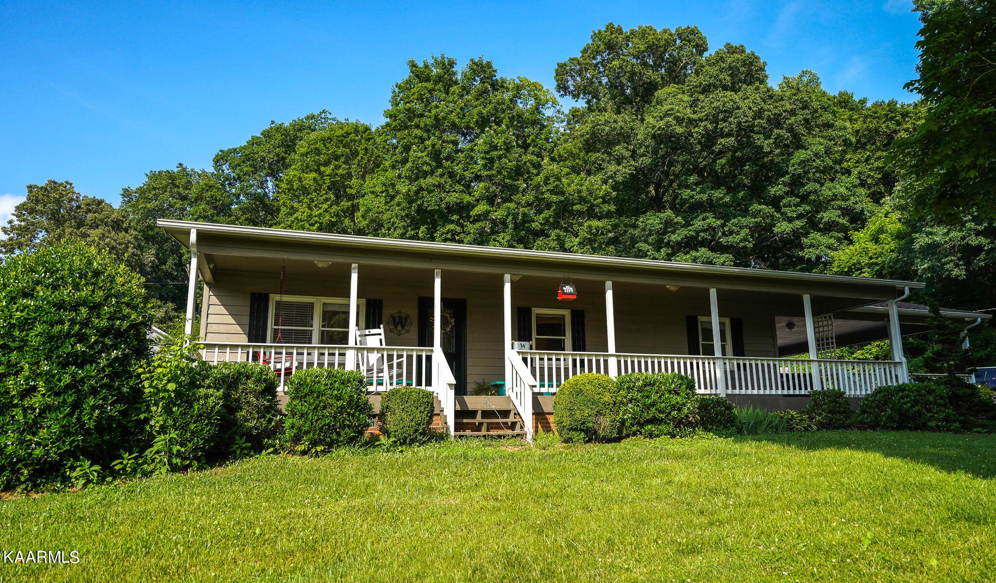 1440 Sulphur Springs Road Clinton, TN 37716 - Photo 1 of 24 front view of a house with a yard