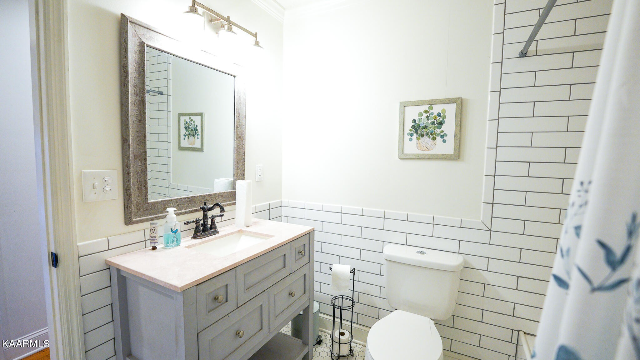 1440 Sulphur Springs Road Clinton, TN 37716 - Photo 15 of 24 a bathroom with a sink mirror vanity and toilet