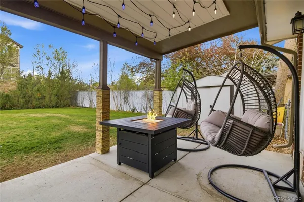 a view of an outdoor sitting area with golf course