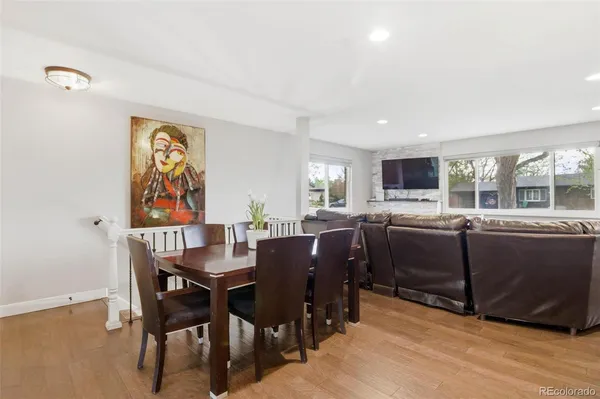a kitchen with a table and chairs in it