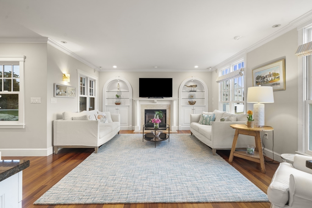 35 Bayberry Road Scituate, MA 02066 - Photo 12 of 39 a living room with furniture and a fireplace