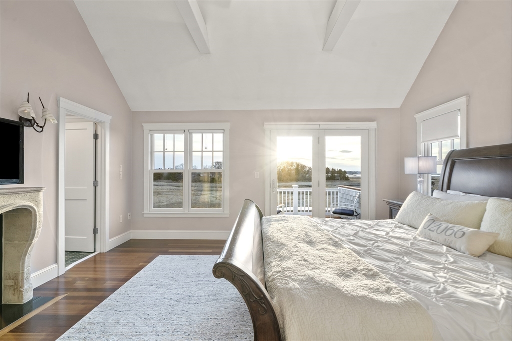 35 Bayberry Road Scituate, MA 02066 - Photo 20 of 39 a spacious bedroom with a large bed and a large window