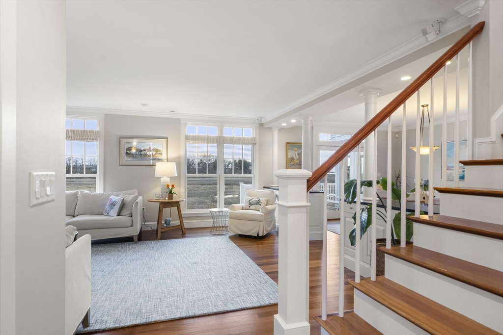 35 Bayberry Road Scituate, MA 02066 - Photo 2 of 39 a living room with furniture and stairs