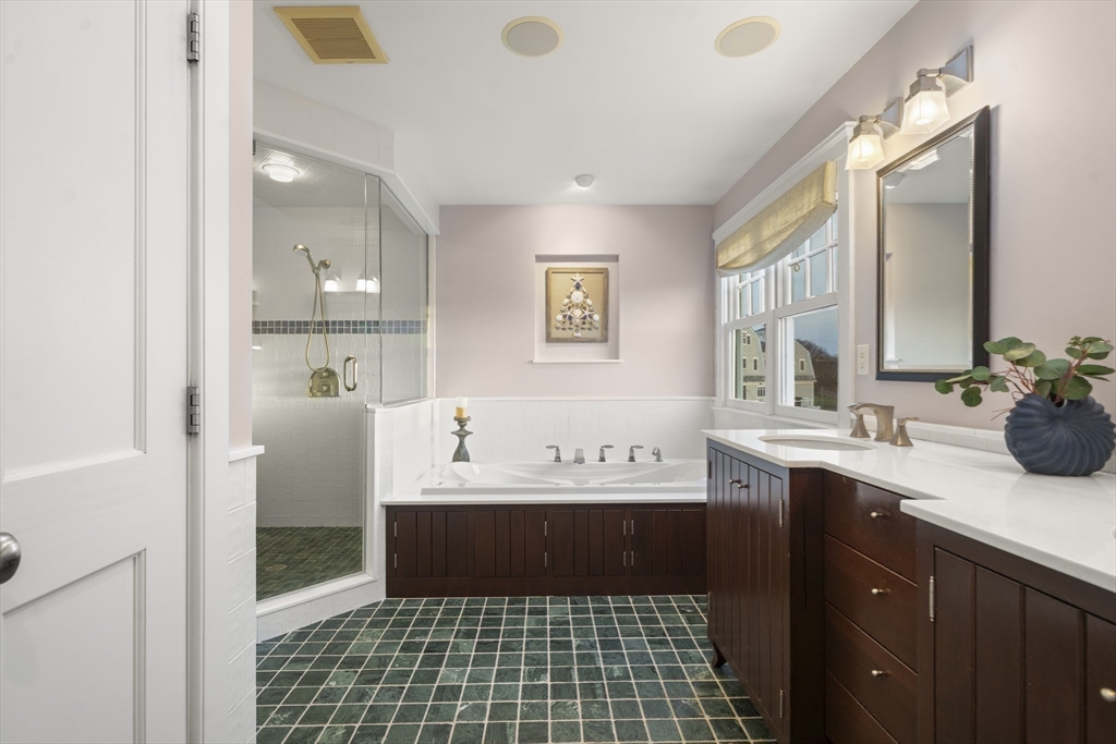 35 Bayberry Road Scituate, MA 02066 - Photo 21 of 39 a bathroom with a sink a mirror and a bathtub