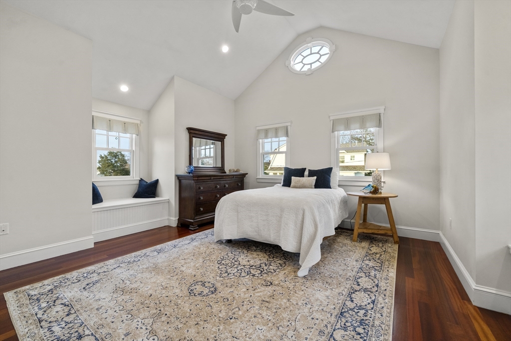 35 Bayberry Road Scituate, MA 02066 - Photo 26 of 39 a spacious bedroom with a bed and a dresser with rug