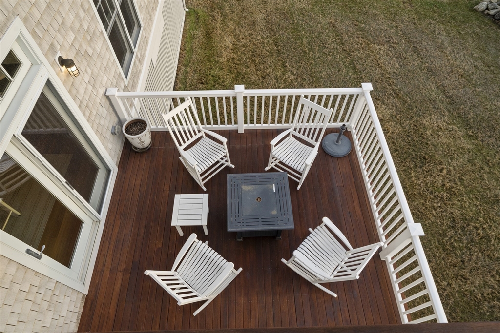 35 Bayberry Road Scituate, MA 02066 - Photo 29 of 39 a view of table and chair with wooden floor