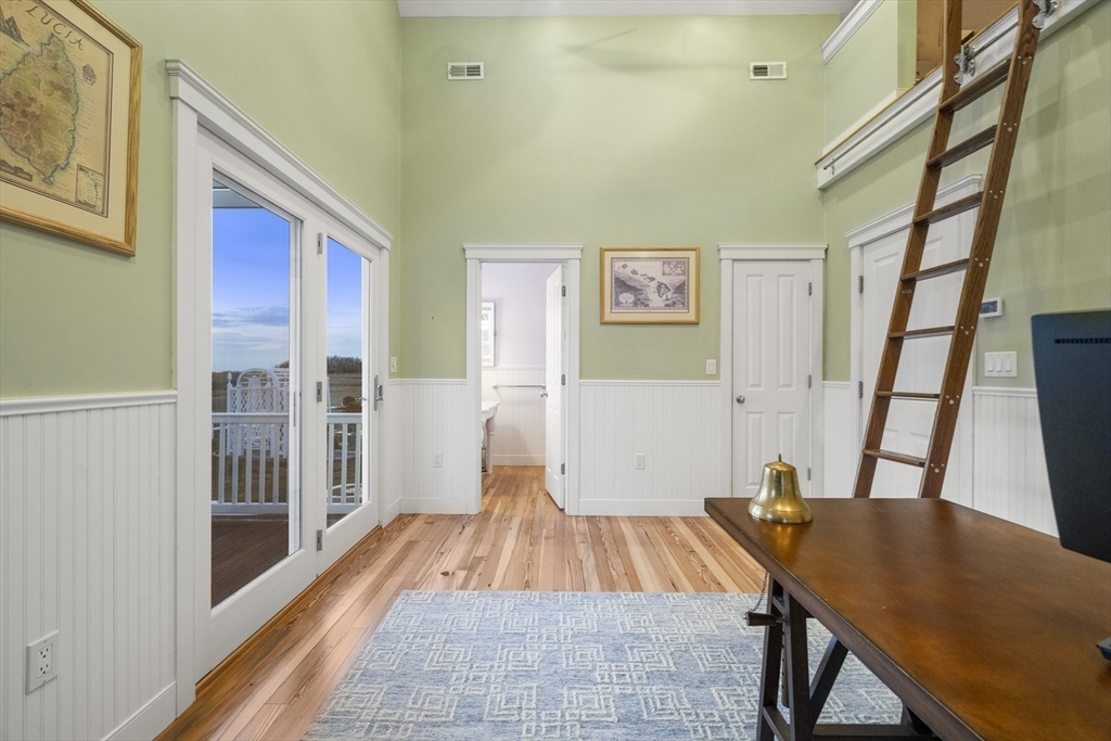 35 Bayberry Road Scituate, MA 02066 - Photo 36 of 39 a living room with a furniture and a table