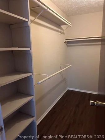 a view of an empty walk in closet