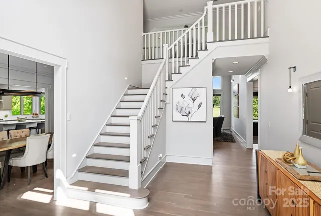 a spacious bathroom with a double vanity sink and a mirror