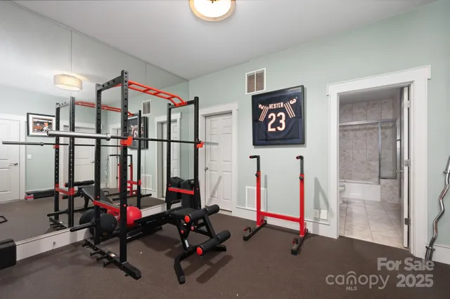 a kitchen with a sink cabinets and a window