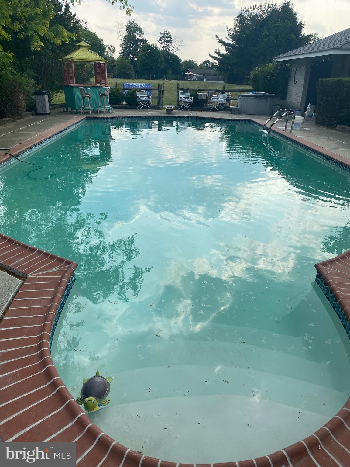 1591 Middletown Road Glen Mills, PA 19342 - Photo 39 of 55 a view of a swimming pool with a yard