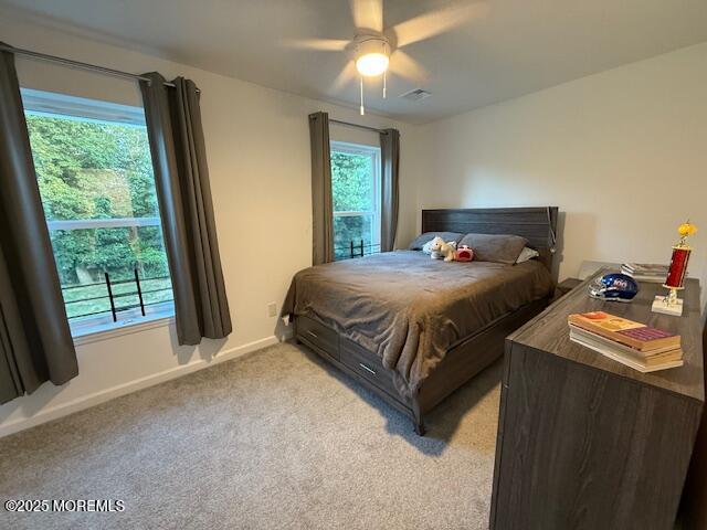 52 Renee Court Jackson, NJ 08527 - Photo 16 of 24 a bedroom with a bed and a large window