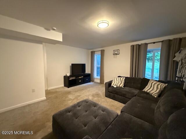 52 Renee Court Jackson, NJ 08527 - Photo 18 of 24 a living room with furniture and a flat screen tv