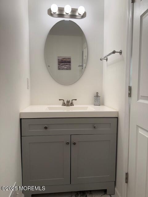 52 Renee Court Jackson, NJ 08527 - Photo 9 of 24 a bathroom with a sink and a mirror