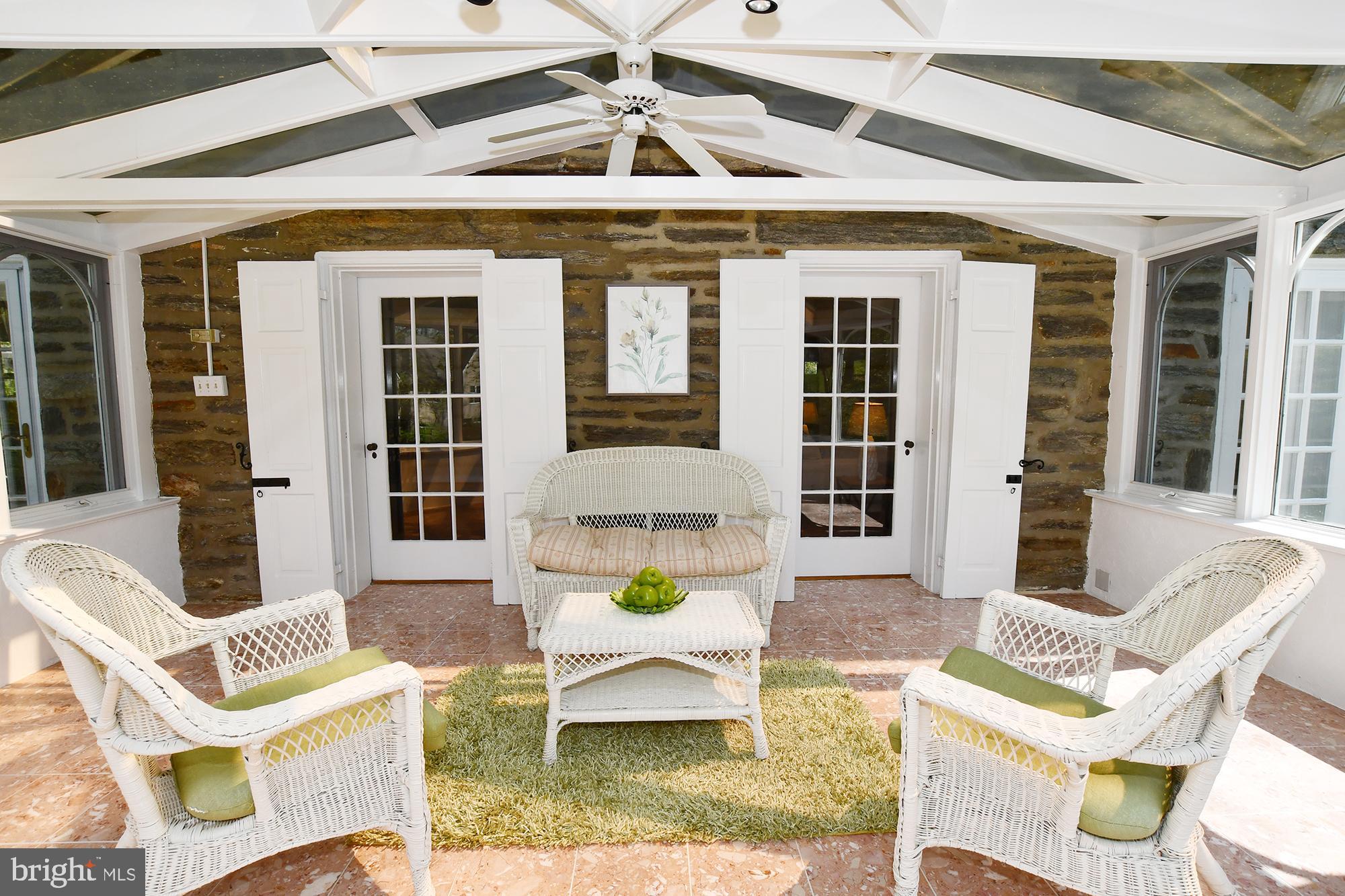 12 Rose Hill Road Media, PA 19063 - Photo 14 of 63 Solarium with doors from LR and DR