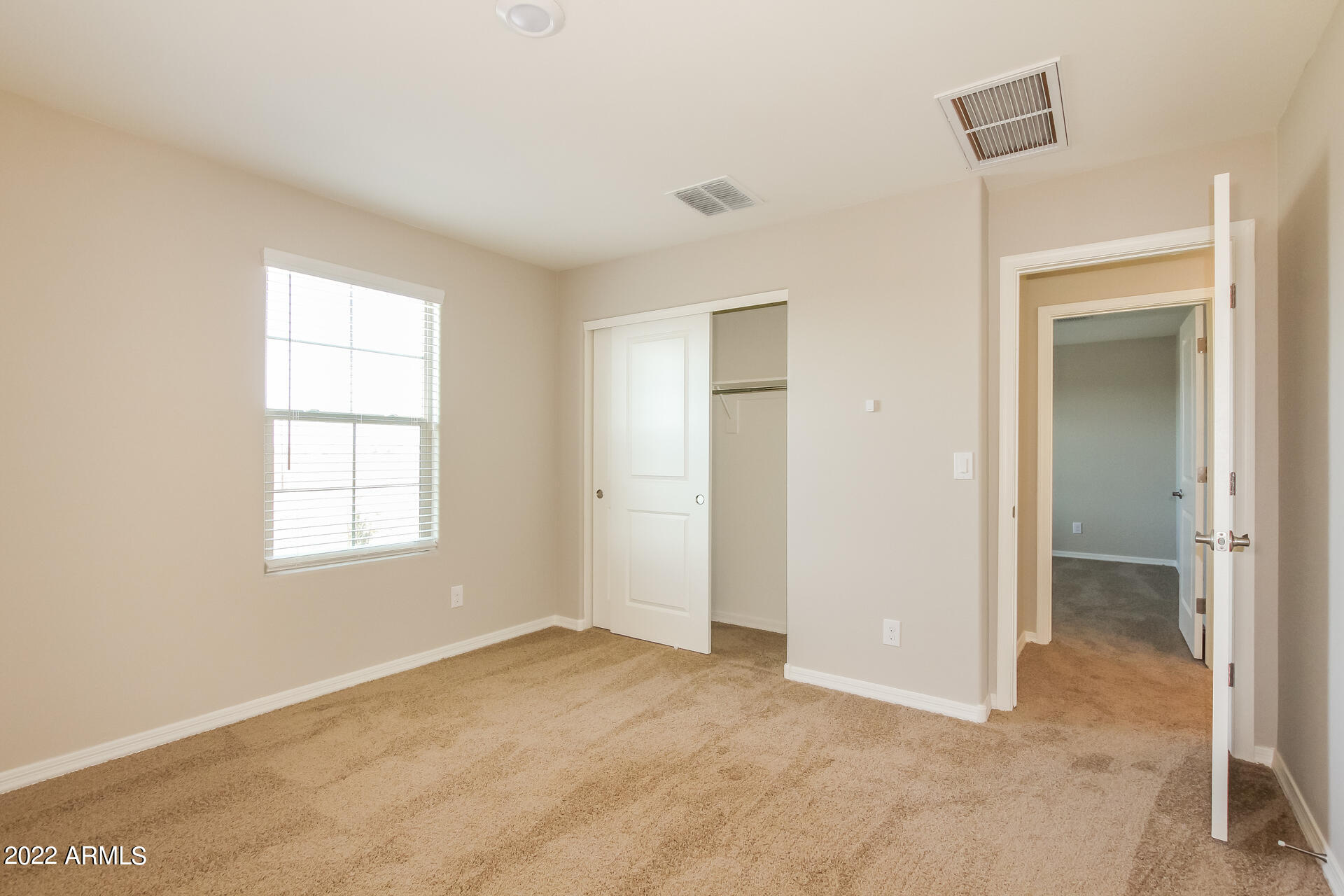 8237 West Odeum Lane Phoenix, AZ 85043 - Photo 10 of 17 011-photo-bedroom-7969715