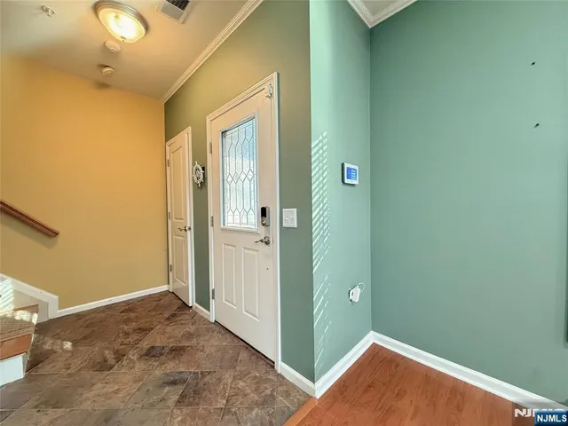 a bathroom with a toilet sink and shower