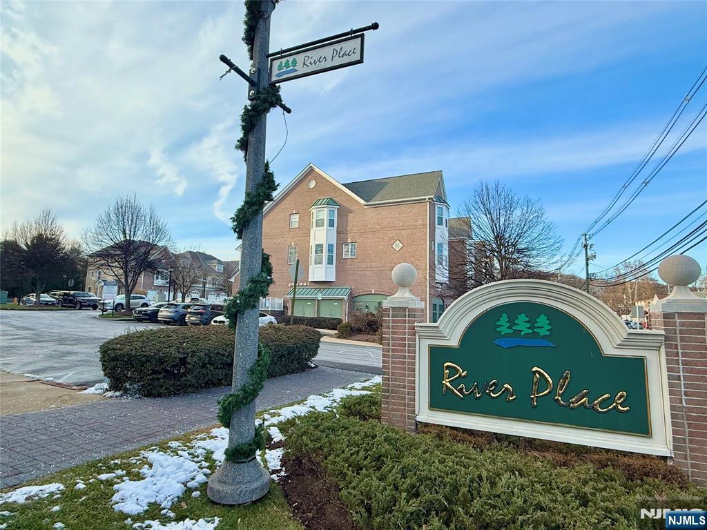 401 River Place Butler, NJ 07405 - Photo 3 of 42 a front view of a house with a garden
