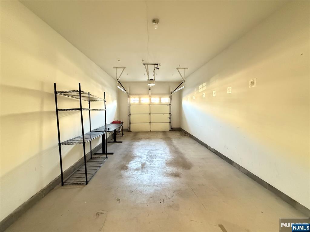 401 River Place Butler, NJ 07405 - Photo 38 of 42 a view of a hallway with stairs
