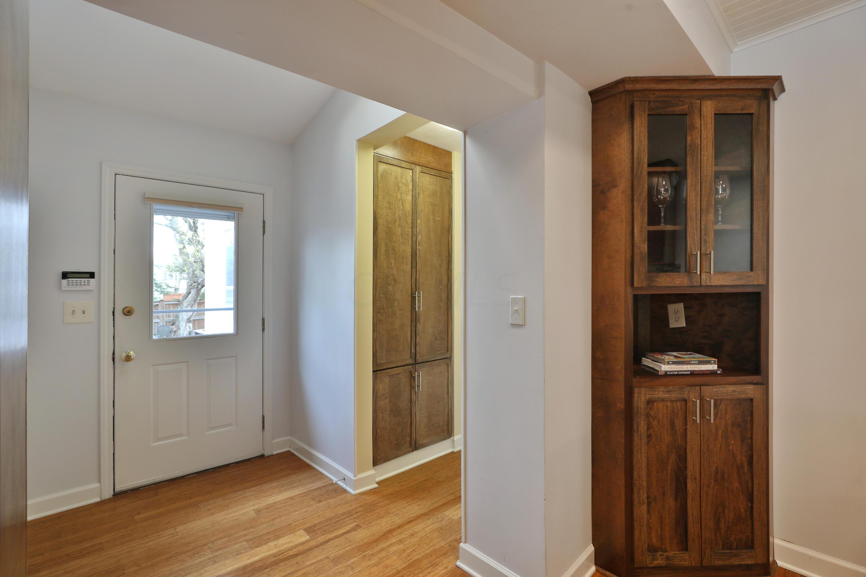2180 Bryden Road Columbus, OH 43209 - Photo 22 of 56 Back door opens to 2 decks. Back hall has closet - can be used as mudroom.