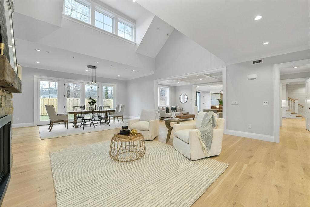 66 Jerusalem Road Cohasset, MA 02025 - Photo 12 of 40 a living room with furniture and a wooden floor