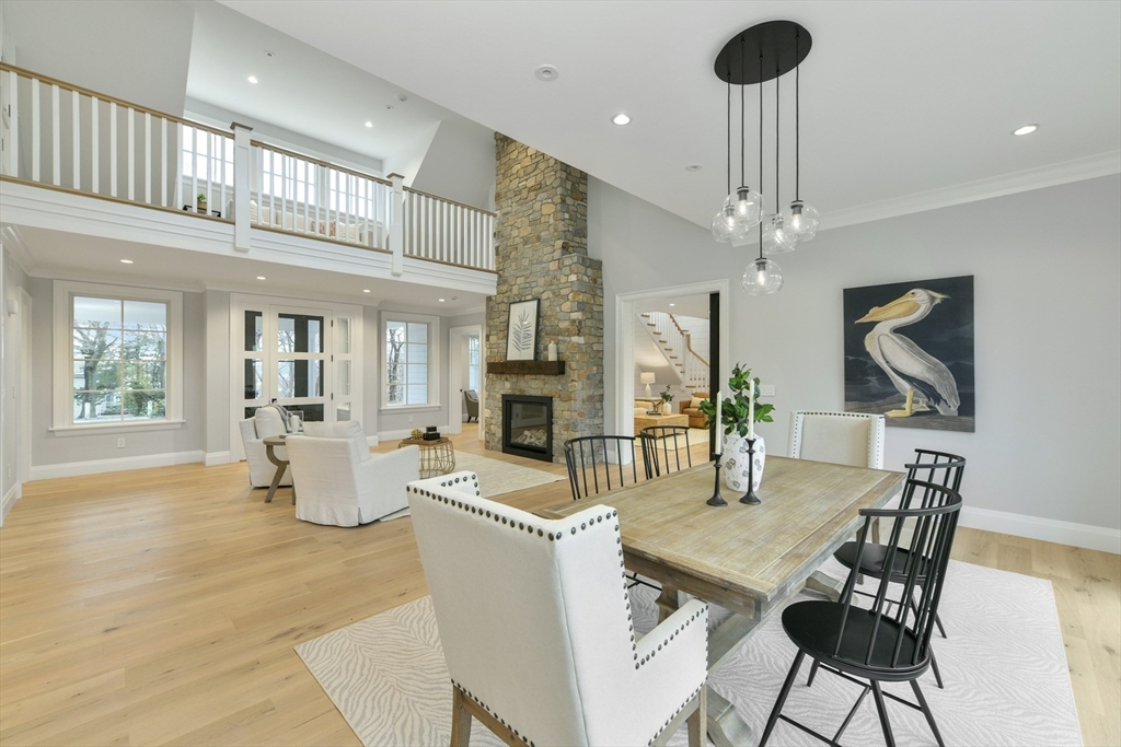 66 Jerusalem Road Cohasset, MA 02025 - Photo 13 of 40 a dining room with furniture a livingroom and chandelier