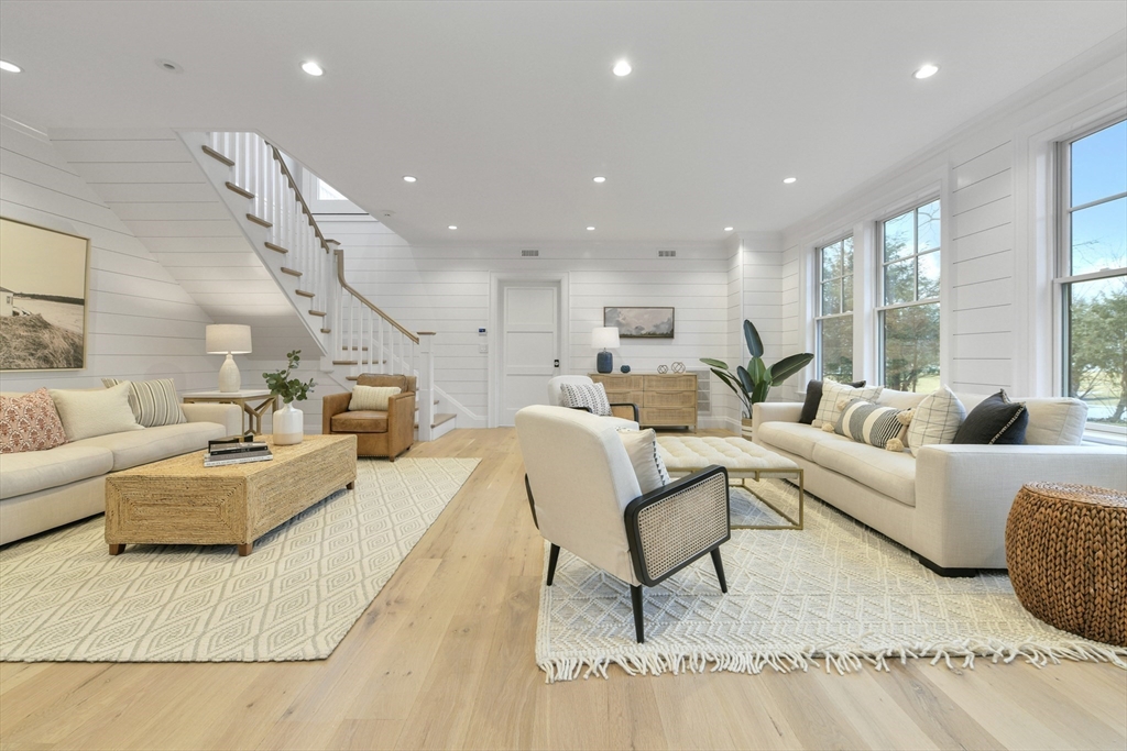 66 Jerusalem Road Cohasset, MA 02025 - Photo 16 of 40 a living room with furniture and a large window