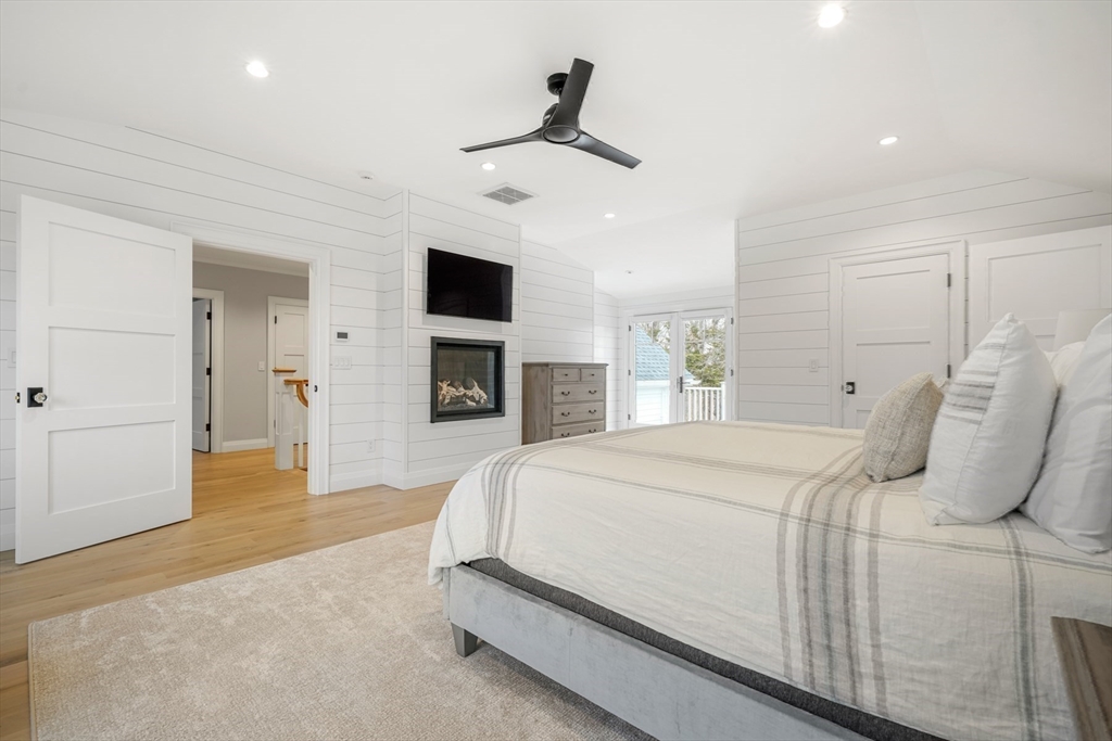 66 Jerusalem Road Cohasset, MA 02025 - Photo 24 of 40 a bed room with a bed and a television