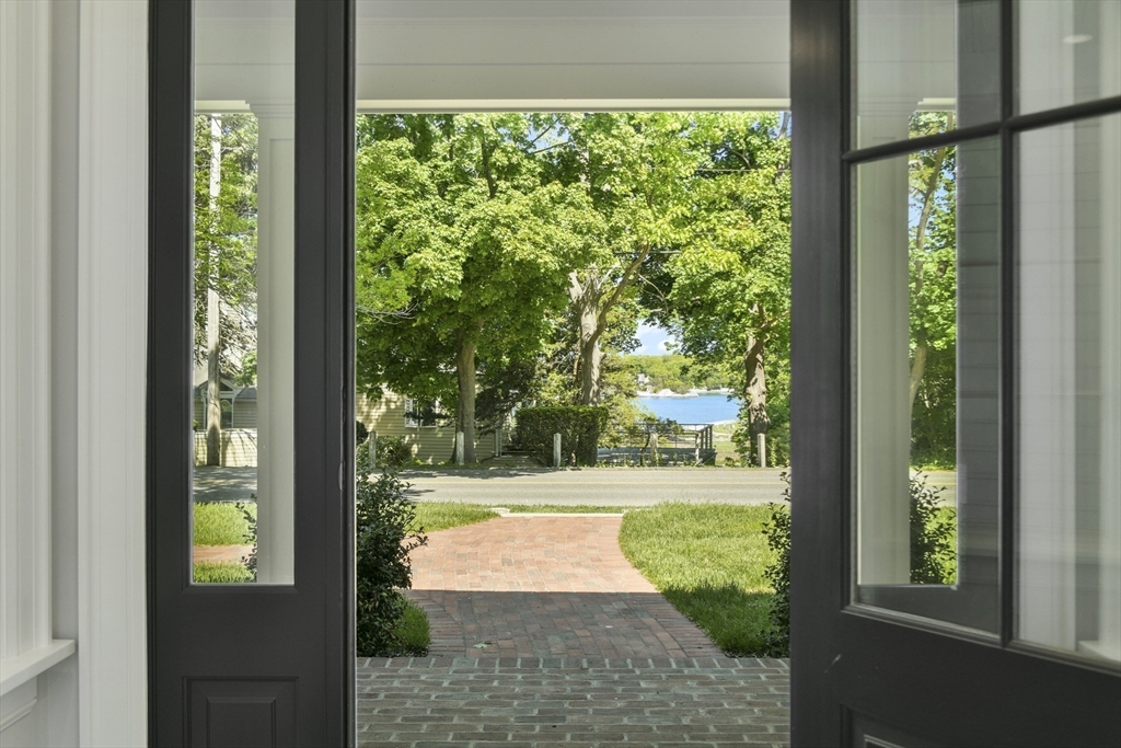 66 Jerusalem Road Cohasset, MA 02025 - Photo 37 of 40 a view of a garden from a window