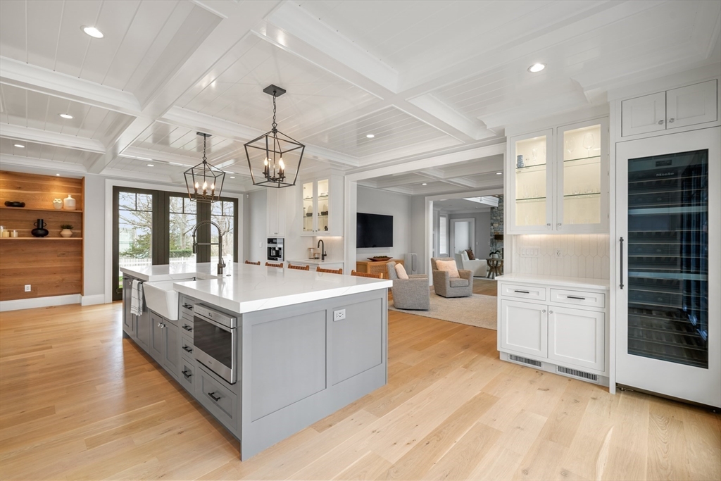 66 Jerusalem Road Cohasset, MA 02025 - Photo 4 of 40 a large kitchen with stainless steel appliances a stove oven and a refrigerator