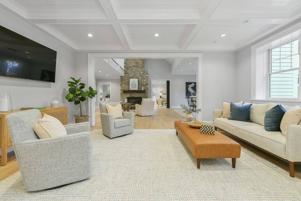 66 Jerusalem Road Cohasset, MA 02025 - Photo 8 of 40 a living room with fireplace furniture and a flat screen tv