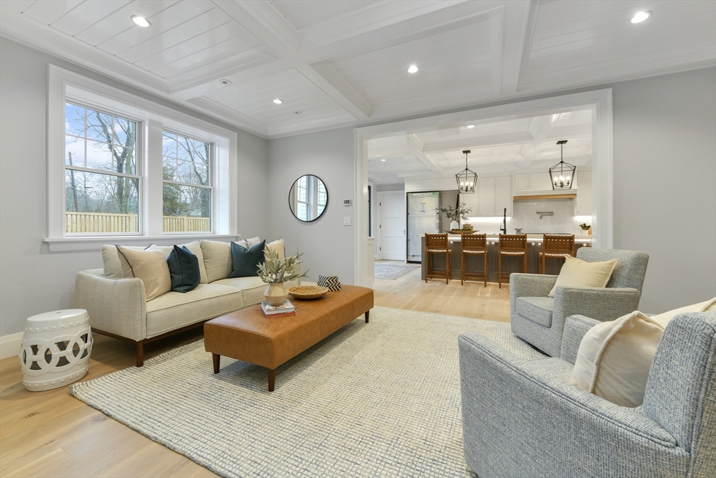 66 Jerusalem Road Cohasset, MA 02025 - Photo 9 of 40 a living room with furniture and wooden floor