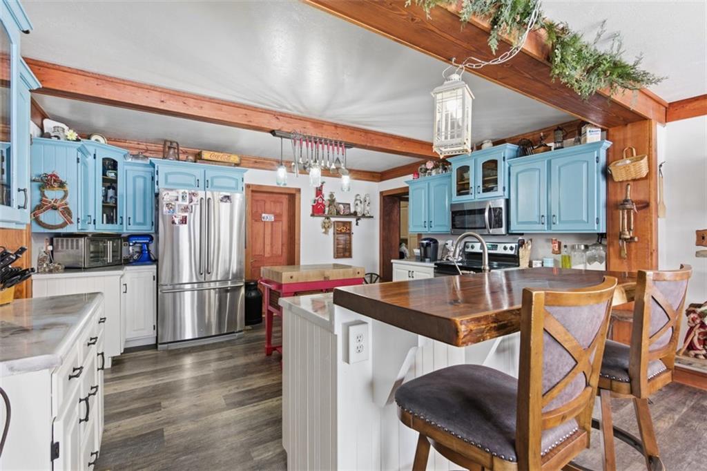 2976 Henderson Road Washington, PA 15301 - Photo 11 of 50 a kitchen with stainless steel appliances granite countertop a sink and a refrigerator