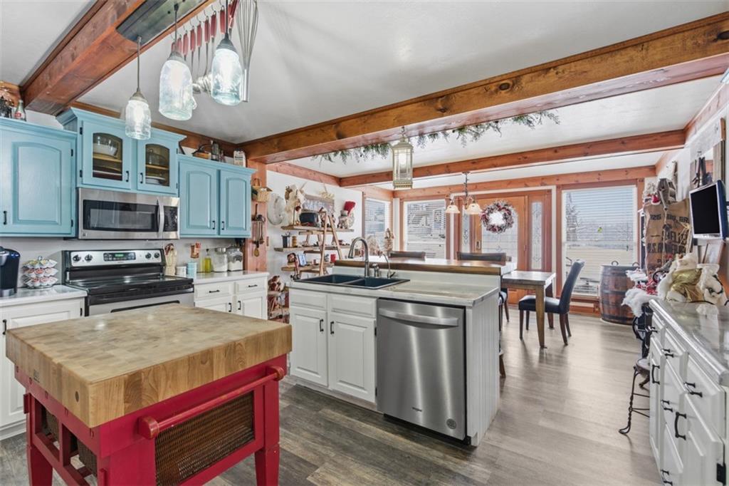 2976 Henderson Road Washington, PA 15301 - Photo 15 of 50 a kitchen with stainless steel appliances granite countertop a stove and a wooden cabinets