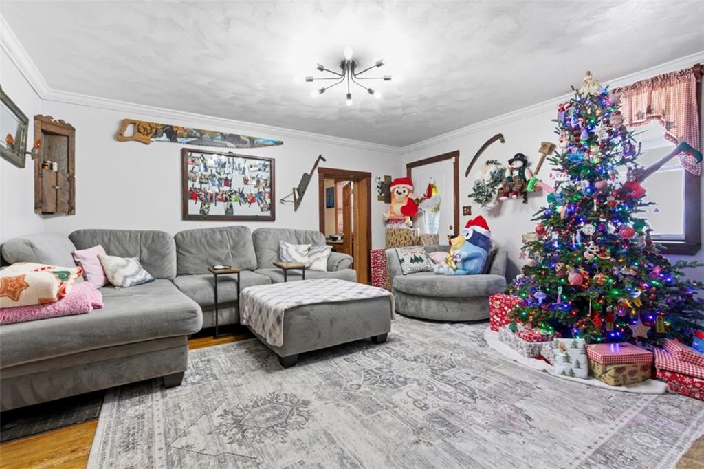 2976 Henderson Road Washington, PA 15301 - Photo 16 of 50 a living room with furniture and flowers