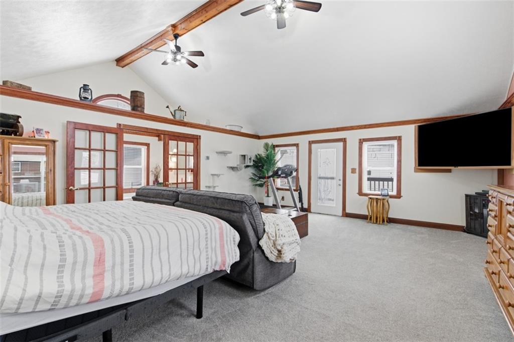 2976 Henderson Road Washington, PA 15301 - Photo 24 of 50 a bedroom with a large bed and a flat tv screen on dresser