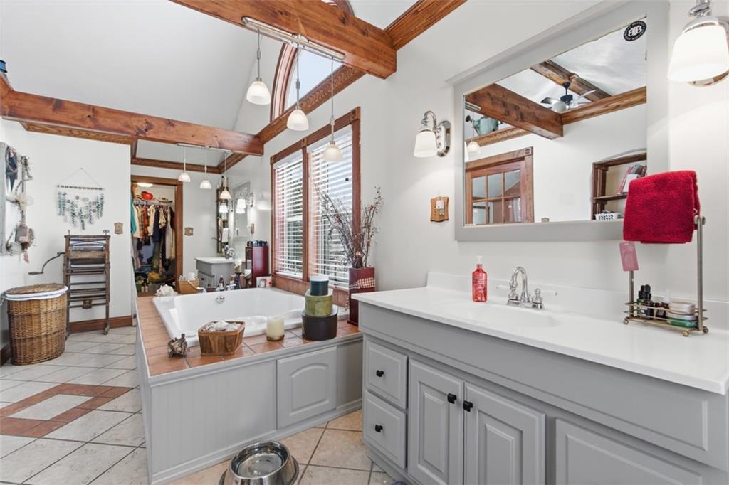 2976 Henderson Road Washington, PA 15301 - Photo 28 of 50 a room with furniture a chandelier a mirror and a sink