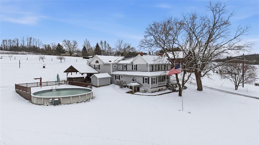 2976 Henderson Road Washington, PA 15301 - Photo 3 of 50 a view of a house with swimming pool and sitting area