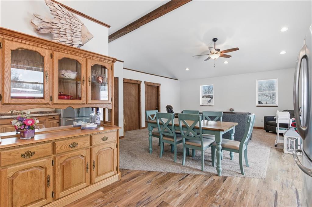 2976 Henderson Road Washington, PA 15301 - Photo 40 of 50 a view of a dining room and livingroom with furniture wooden floor a chandelier