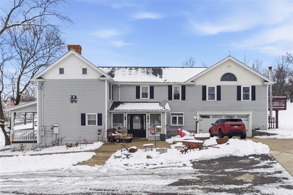 2976 Henderson Road Washington, PA 15301 - Photo 6 of 50 a front view of a house with cars