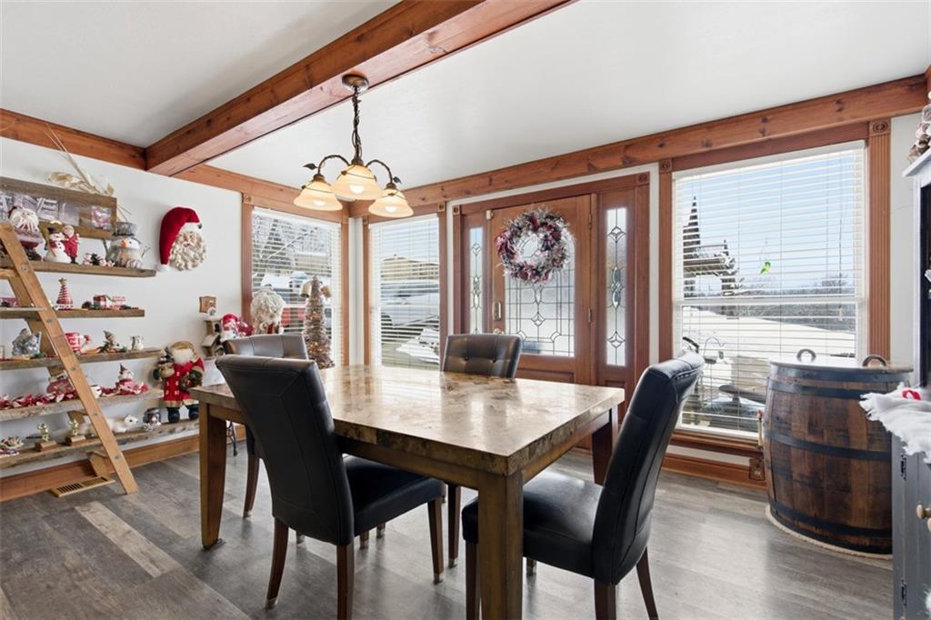 2976 Henderson Road Washington, PA 15301 - Photo 9 of 50 a dining room with furniture a chandelier and wooden floor