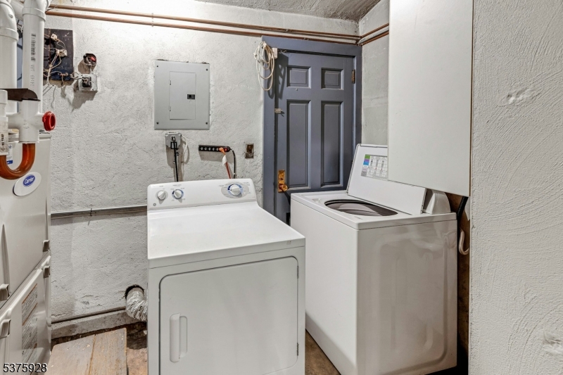 82 Winsor Place Glen Ridge, NJ 07028 - Photo 15 of 17 a utility room with dryer and washer