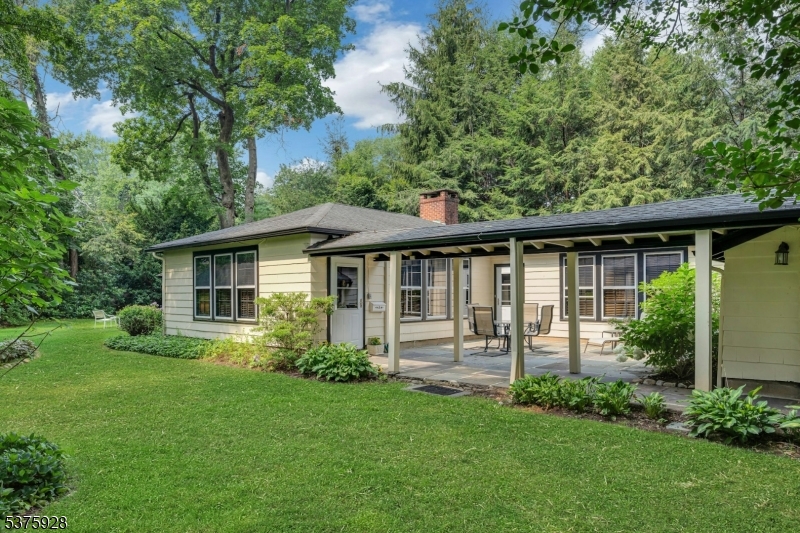 82 Winsor Place Glen Ridge, NJ 07028 - Photo 4 of 17 a view of a house with backyard and garden