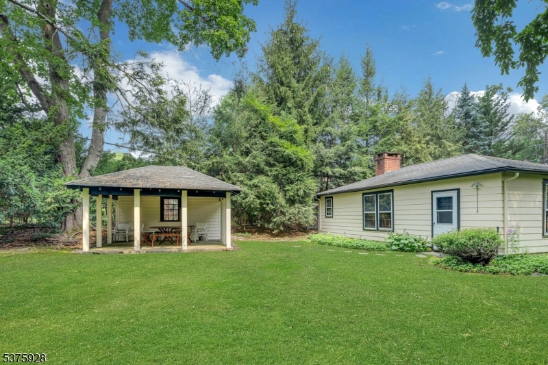 82 Winsor Place Glen Ridge, NJ 07028 - Photo 5 of 17 a view of a house with yard and glass windows