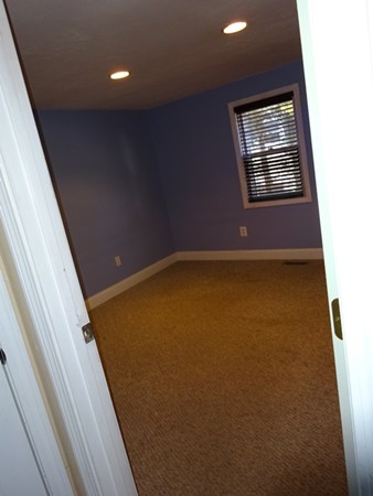24 Gitchee Gummie Road Wareham, MA 02532 - Photo 5 of 30 a view of an empty room with a window