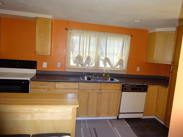 24 Gitchee Gummie Road Wareham, MA 02532 - Photo 8 of 30 a view of kitchen with wooden floor and cabinets
