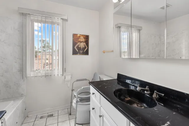 a kitchen that has a sink and a stove