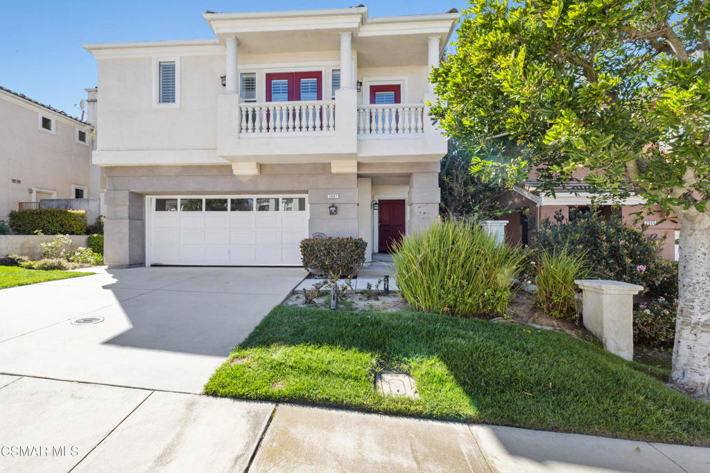 3881 Timberridge Road Moorpark, CA 93021 - Photo 1 of 28 a front view of a house with a garden and plants
